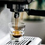 Espresso being poured from coffee machine